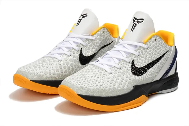 Nike Chaussures de Basketball Silhouette Low-Top Blanc Orange avec Upper Texturisé Honeycomb 3