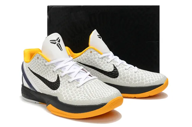 Nike Chaussures de Basketball Silhouette Low-Top Blanc Orange avec Upper Texturisé Honeycomb 5