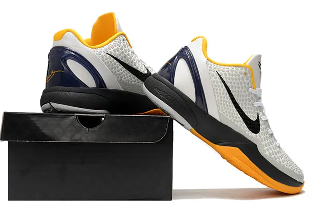 Nike Chaussures de Basketball Silhouette Low-Top Blanc Orange avec Upper Texturisé Honeycomb 6