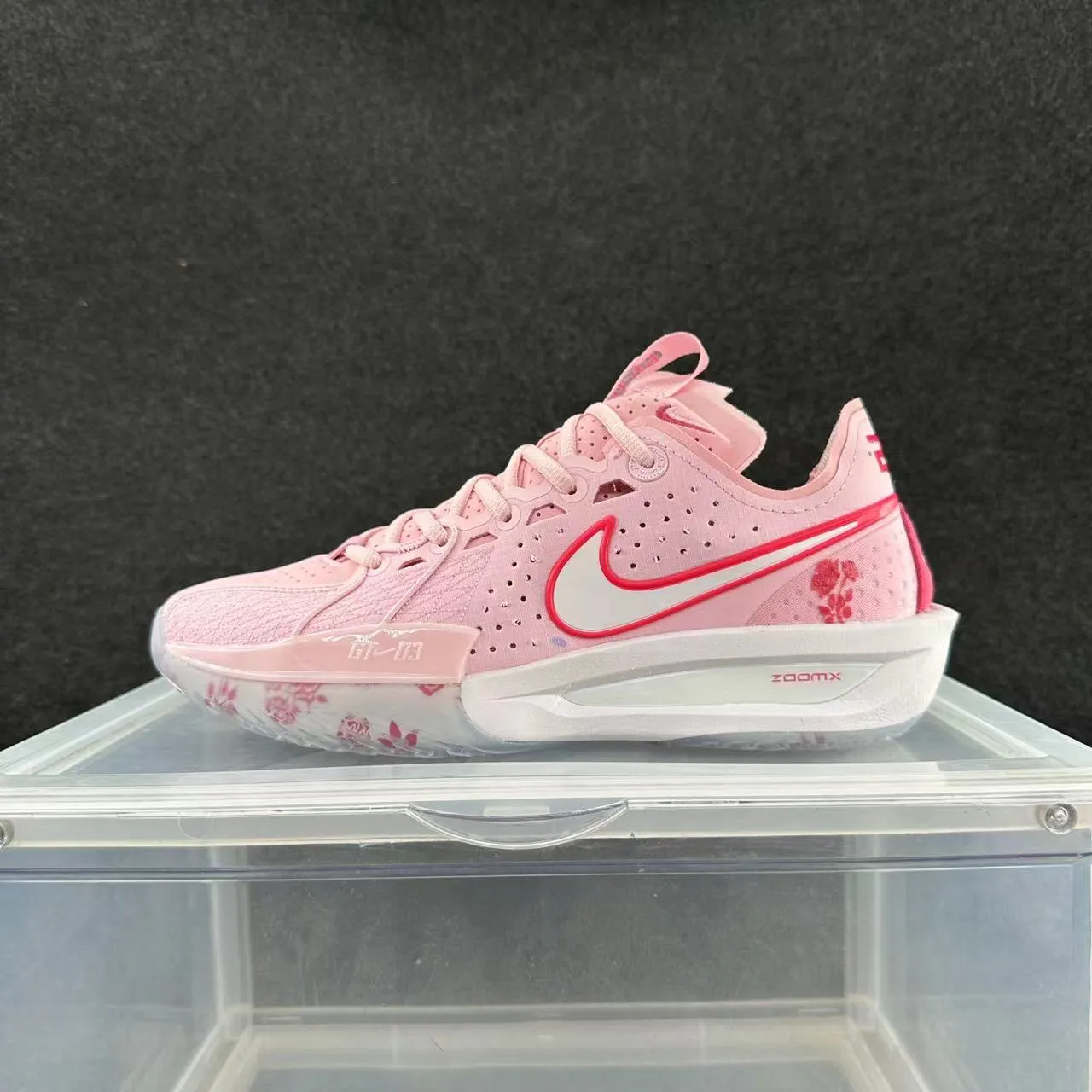 Nike ZoomX Chaussures de running avec upper perforé en maille rose blanc semelle translucide imprimé floral 2