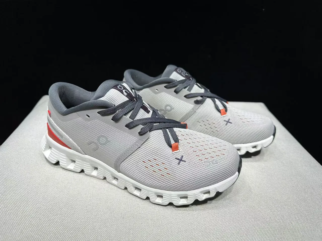 On Cloud Gray White Engineered Knit Upper Segmented CloudTec Midsole Lifestyle Sneakers 6