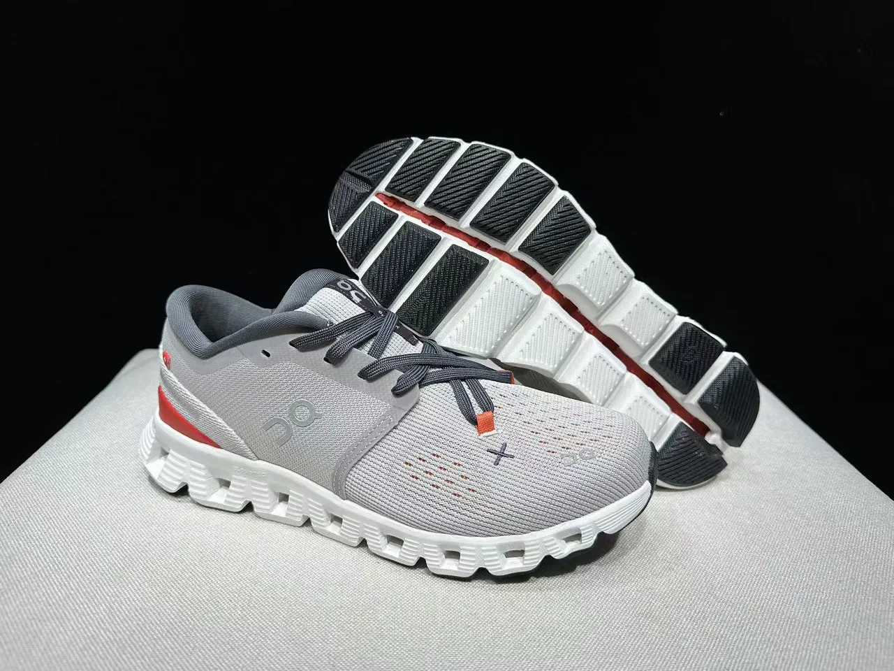 On Cloud Gray White Engineered Knit Upper Segmented CloudTec Midsole Lifestyle Sneakers 7