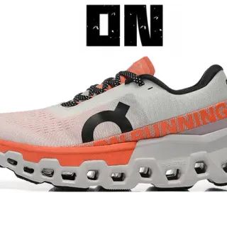 On Cloudmonster Gris Naranja Parte superior de malla ingenierizada Hexagonal CloudTec Pod Midsole Zapatillas de correr