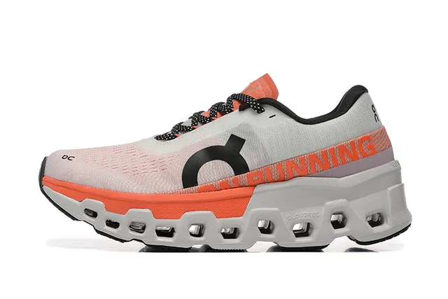 On Cloudmonster Gris Naranja Parte superior de malla ingenierizada Hexagonal CloudTec Pod Midsole Zapatillas de correr 5