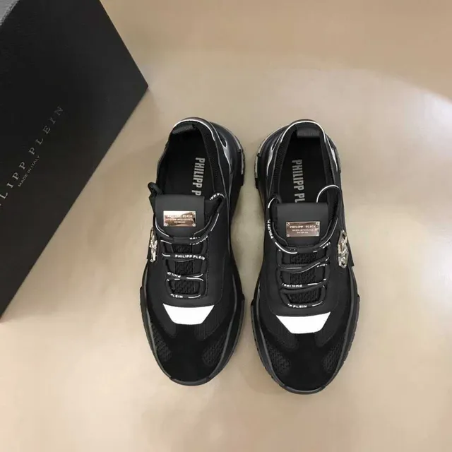 Philipp Plein Tênis pretos e brancos com upper de malha, sola esculpida e sola chunky 6
