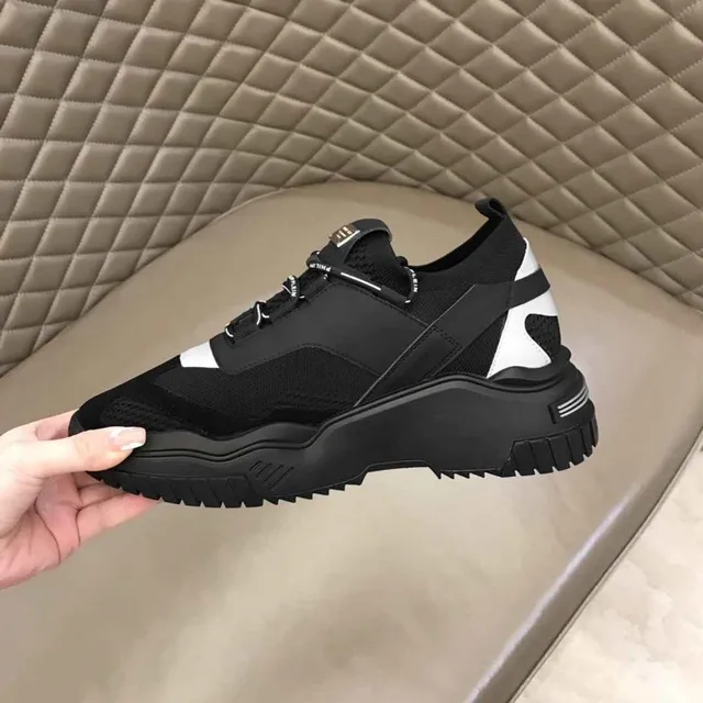 Philipp Plein Tênis pretos e brancos com upper de malha, sola esculpida e sola chunky 8
