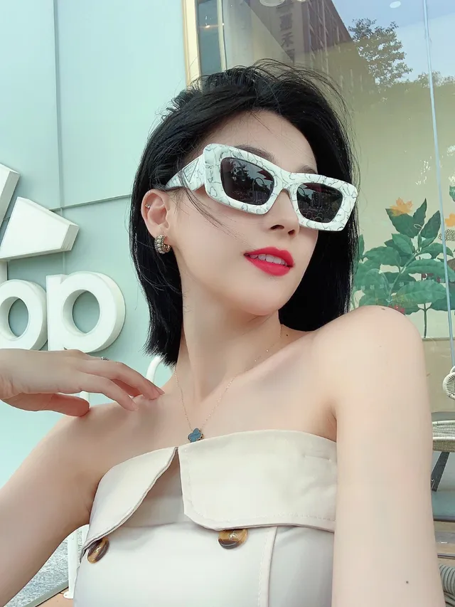 Prada Angular Cat-Eye Glossy Black Sunglasses 4