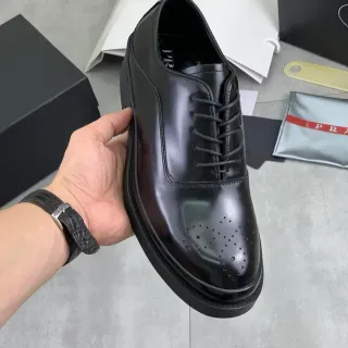 Prada Black Glossy Leather Perforated Toe Brogue