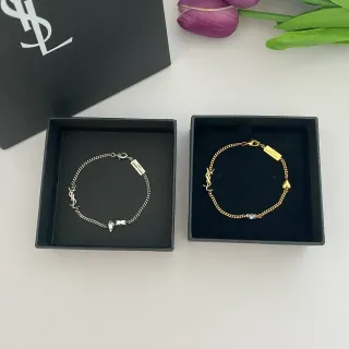 سوارة سلسلة Saint Laurent Monogram فضي ذهبي كارم