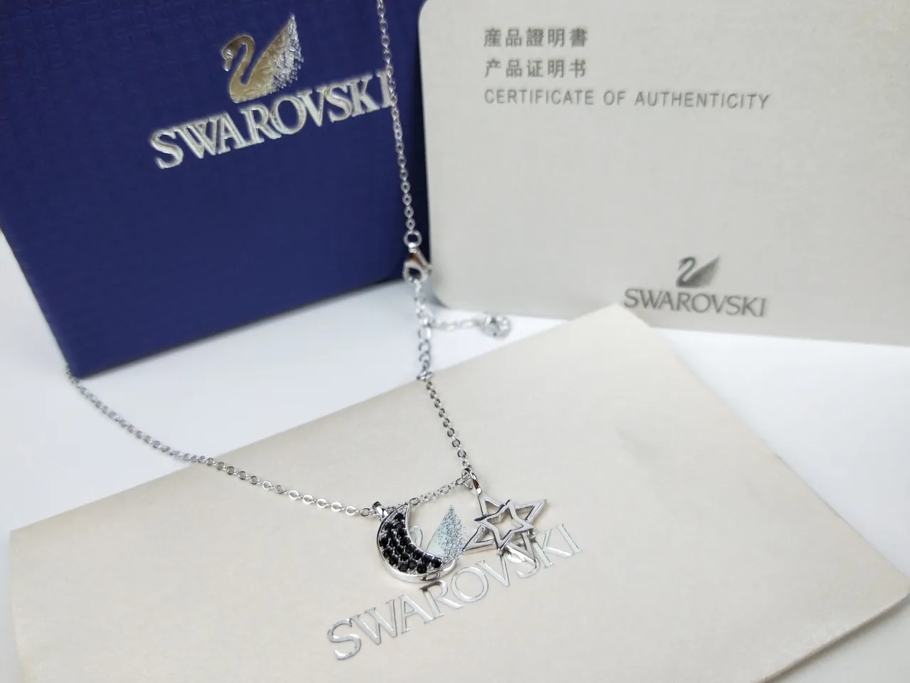Swarovski Collier pendentif Lune croissante et étoile 13
