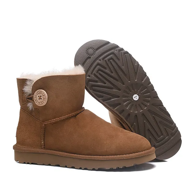 UGG Classic Mini चेस्टनट सूड शियरलिंग लाइन एंक्ल बूट्स 4