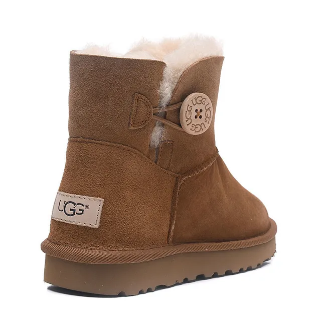 UGG Classic Mini चेस्टनट सूड शियरलिंग लाइन एंक्ल बूट्स 6