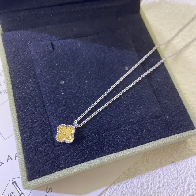Van Cleef & Arpels Alhambra Four-Leaf Clover Yellow Gold and White Metal Necklace 3