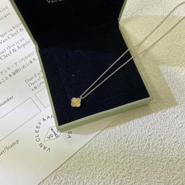 Van Cleef & Arpels Alhambra Four-Leaf Clover Yellow Gold and White Metal Necklace 4