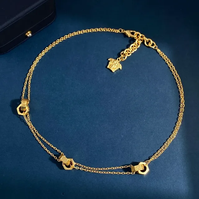Versace Chain Reaction ton doré Medusa pendentif collier 2