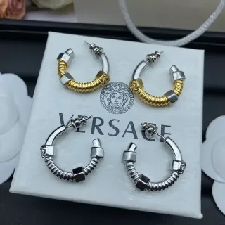Versace Pendientes Plata y Oro Banda Resorte Enroscada Acentos Cubo Geométrico