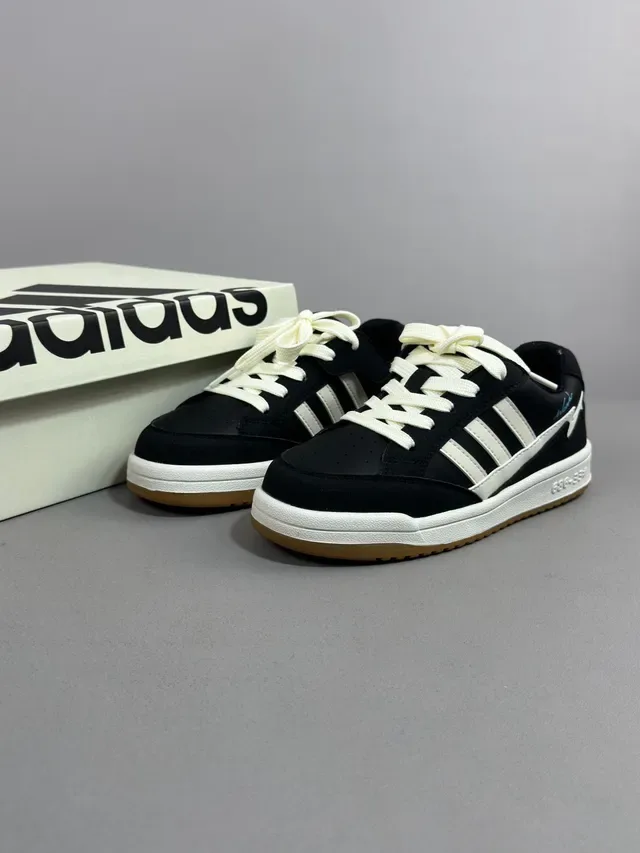 Adidas Black and White Three-Stripe Cupsole Lifestyle Sneakers 7