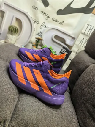Adidas zapatillas moradas y naranjas para correr 7