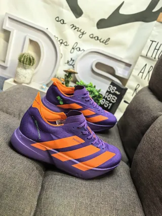 Adidas zapatillas moradas y naranjas para correr 9