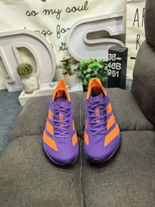 Adidas zapatillas moradas y naranjas para correr 10