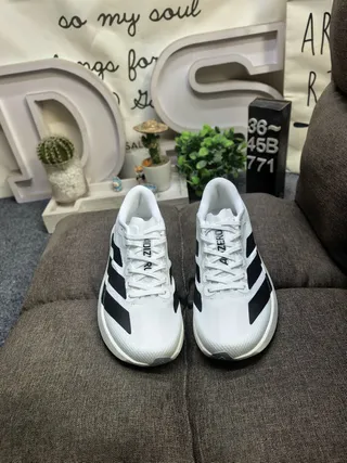 Adidas White and Black Three-Stripe Lifestyle Sneakers 10