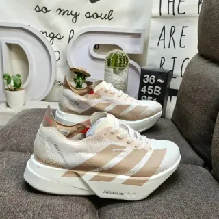 Adidas Zapatillas de Running con Upper de Punto Blanco Beige y Gradiente Salpicado