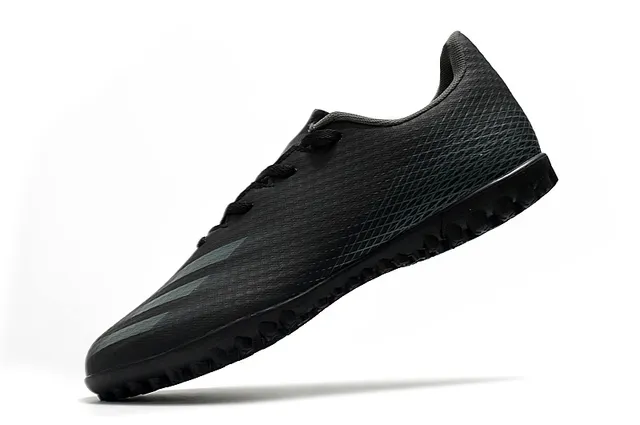 Adidas Sapatos de futebol branco e preto de corte baixo com upper sintético, linha gráfica de gradiente para grama artificial 17