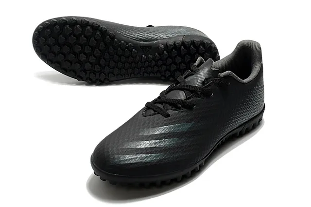 Adidas Sapatos de futebol branco e preto de corte baixo com upper sintético, linha gráfica de gradiente para grama artificial 18
