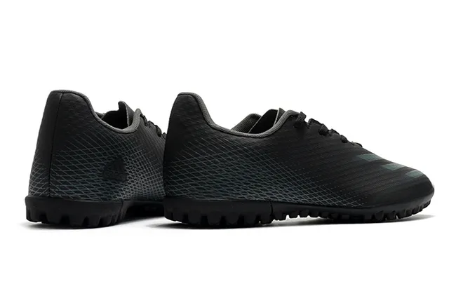Adidas Sapatos de futebol branco e preto de corte baixo com upper sintético, linha gráfica de gradiente para grama artificial 19