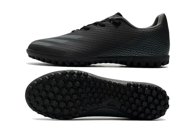 Adidas Sapatos de futebol branco e preto de corte baixo com upper sintético, linha gráfica de gradiente para grama artificial 21