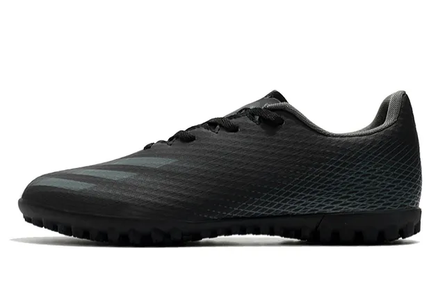 Adidas Sapatos de futebol branco e preto de corte baixo com upper sintético, linha gráfica de gradiente para grama artificial 22