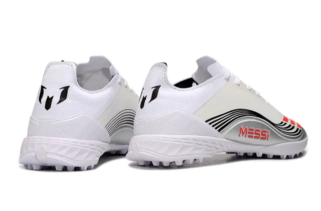 Adidas Chaussures de football en gazon blanc noir à coupe basse tige synthétique motif graphique ondulé 5