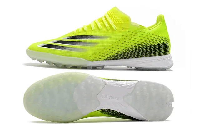 Adidas Chaussures de football jaune noir avec upper en knit, lacets asymétriques et gazon artificiel 20