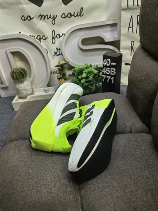 Adidas Jaune Noir Néon Vert Lime Acento Panneaux latéraux perforés Chaussures de course 6
