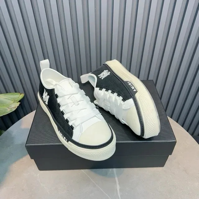 Amiri Skel Top Low Black and White حذاء أسلوب حياة 4