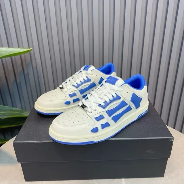 Amiri Skel Top Low White and Blue baskets lifestyle 14