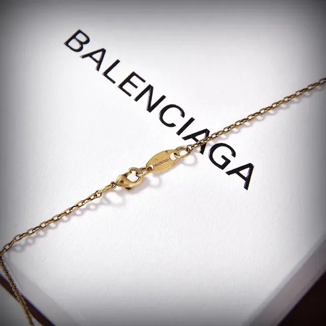 Collier Balenciaga Le Cagole Miniature Sac à Main Doré en Métal Structuré 3