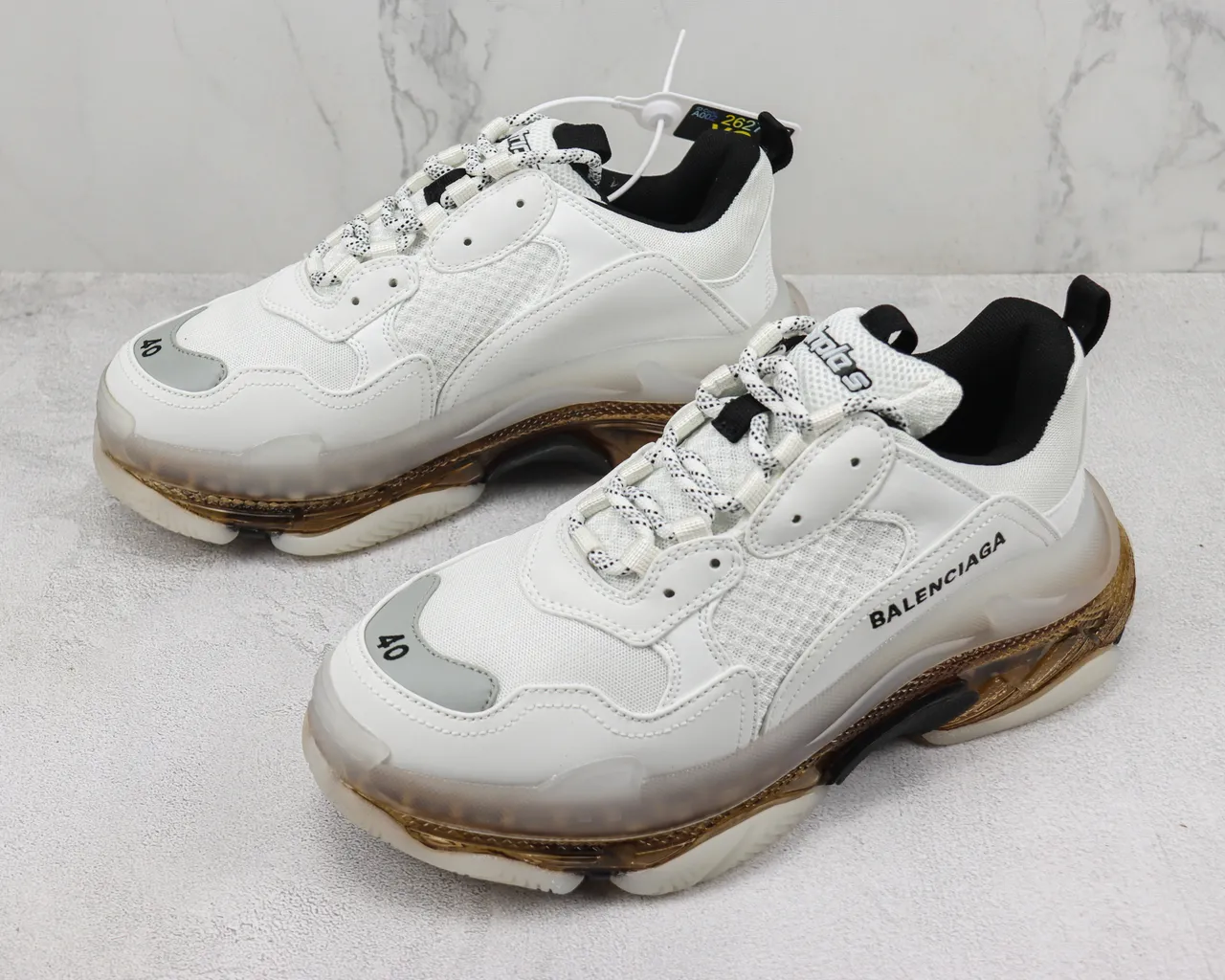 Balenciaga Triple S sneakers chunky blanches et dorées 4