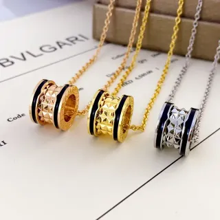 Bvlgari Gold Black Cylindrical Multi-Band Pendant Faceted Pyramidal Texture Necklace