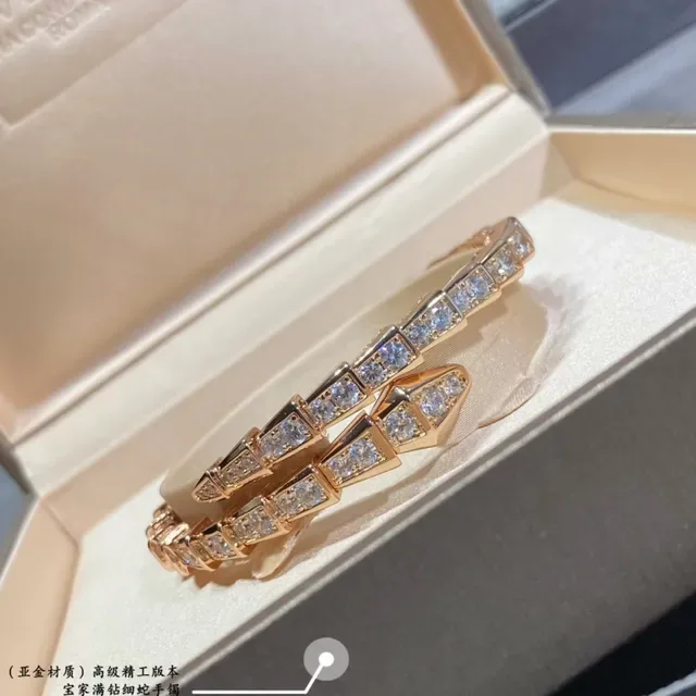 Bvlgari Serpenti Bracelet Argent et Or Maillons Articulés Géométriques et Pierres Pavé 4
