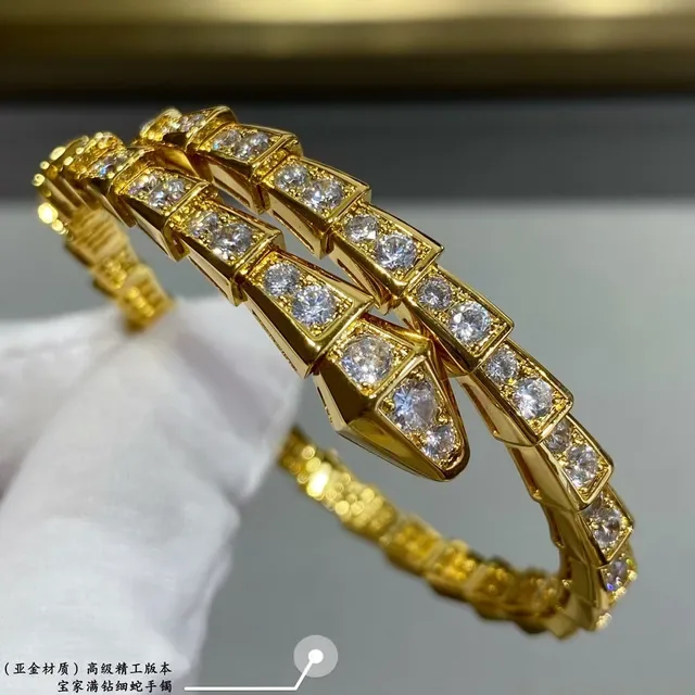 Bvlgari Serpenti Bracelet Argent et Or Maillons Articulés Géométriques et Pierres Pavé 5