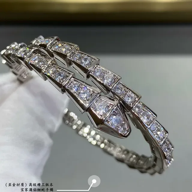 Bvlgari Serpenti Bracelet Argent et Or Maillons Articulés Géométriques et Pierres Pavé 6