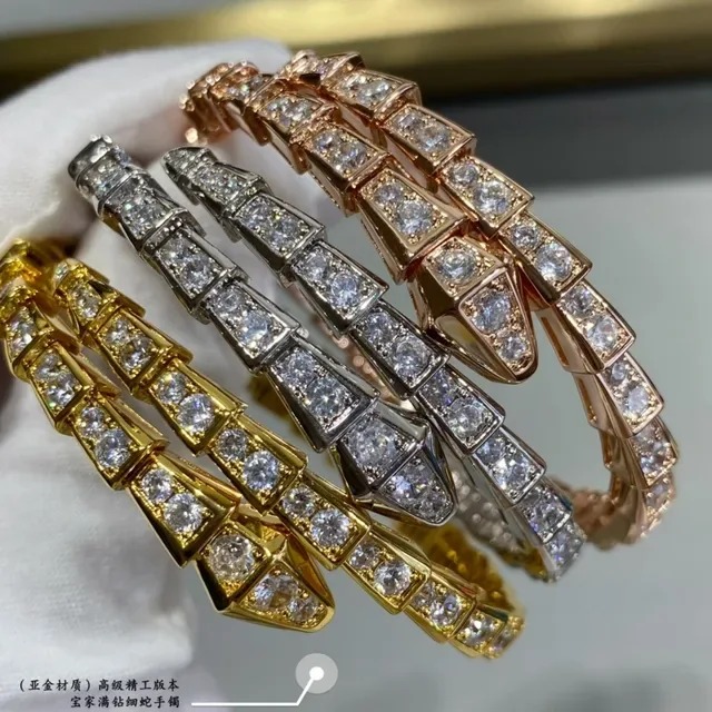 Bvlgari Serpenti Bracelet Argent et Or Maillons Articulés Géométriques et Pierres Pavé 9