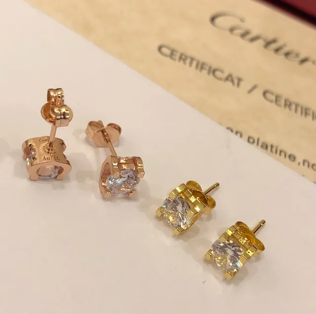 Boucles d'oreilles Cartier Or Transparente Solitaire Quatre Griffes 2