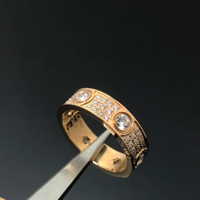 Cartier Love Bague en or et argent incrustée de diamants pavé motif vis biseau 2