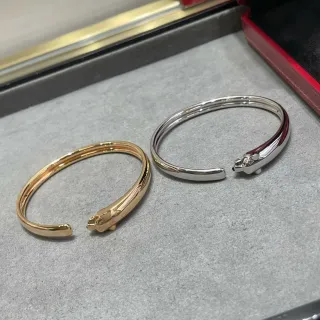 Cartier Panthère Gold and Silver Panther Head Open Bangle Bracelets