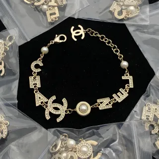 Chanel CHANEL Letter Charm Gold-Tone Pearl Bracelet