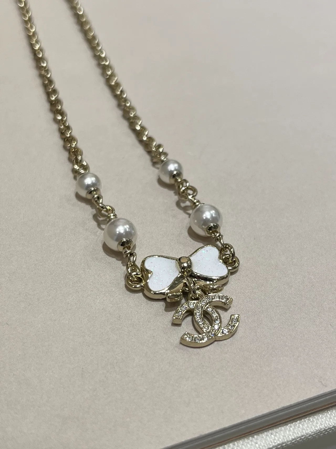 Chanel Pearl and Bow Charm Gold-Tone Bracelet 4