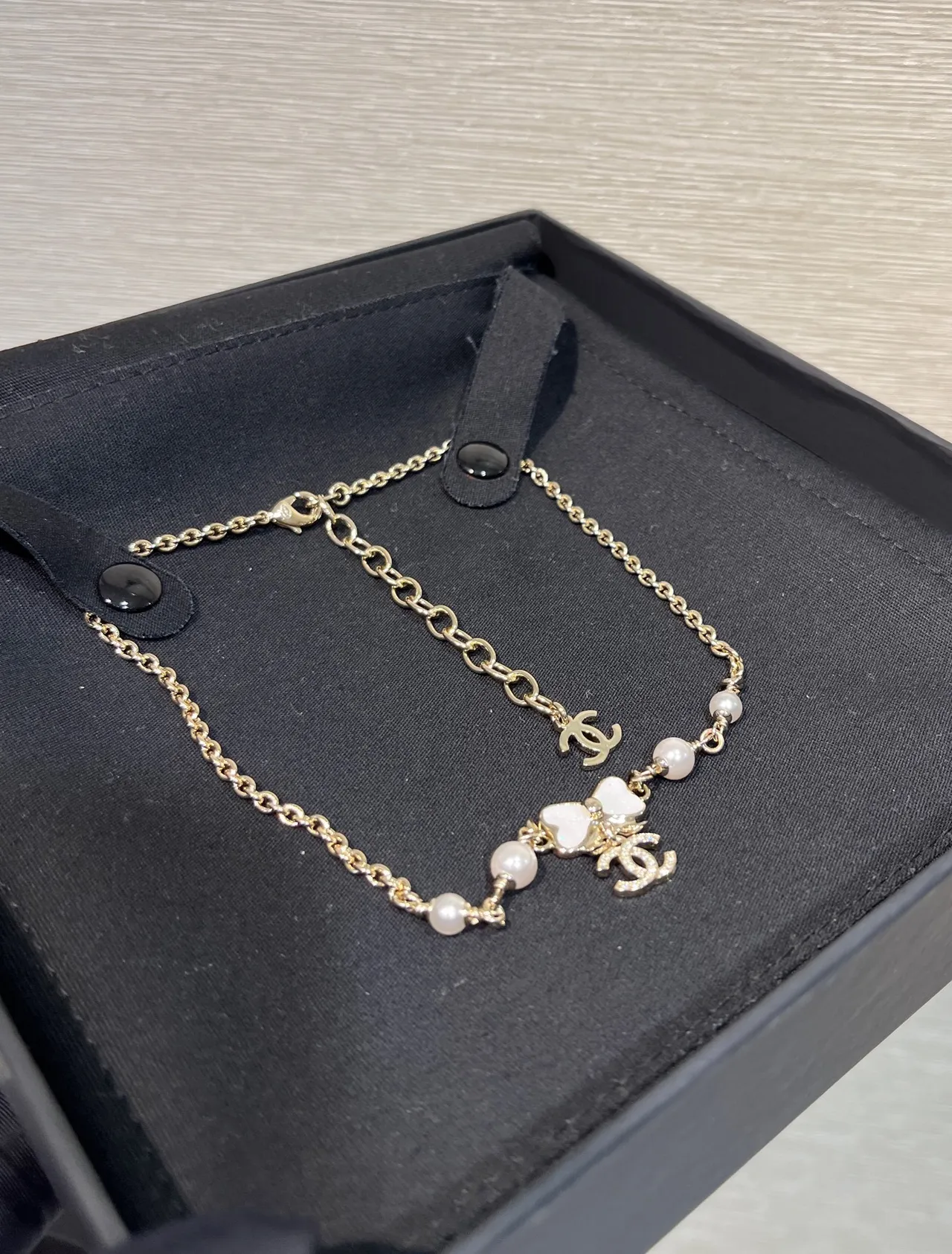 Chanel Pearl and Bow Charm Gold-Tone Bracelet 9