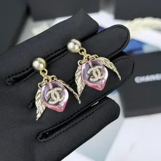 Chanel Pink Resin Winged CC Logo Earrings